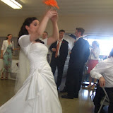 Alex Tosses the Bouquet to the Crowd of Single Ladies