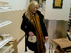 Britni struck a pose with a little wooden purse in the wood crafts aisle.