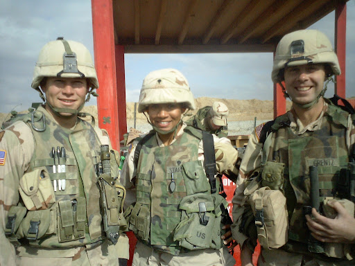 SPC Eric Biddle, SPC/E-4 Stephanie Starkey, and SGT Andy Grentz take a team photo in Afghanistan. Starkey served one tour in Afghanistan and another in Iraq before working as a counslor at the Springfield Vet Center. (Photo provided by: Stephanie Starkey)