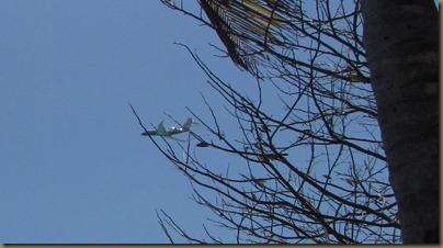plane over Geger Key beach