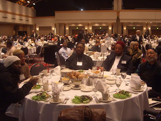 Abdullah Hakim Quick (2nd from right)