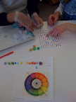 Britni and Elizabeth met to review the colors and placement of the dots. Britni and Elizabeth met to review the colors and placement of the dots.