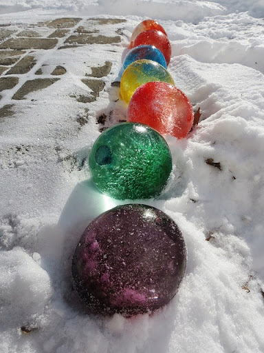One of Martha's favorite tricks is to freeze full water balloons and use them in an ice bucket to keep drinks cold. Take that one step further by adding a bit of food coloring when you fill the balloons. Once they're frozen, cut off the balloon for colorful, oversized ice cubes. One of Martha's favorite tricks is to freeze full water balloons and use them in an ice bucket to keep drinks cold. Take that one step further by adding a bit of food coloring when you fill the balloons. Once they're frozen, cut off the balloon for colorful, oversized ice cubes.