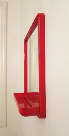 Mäkisen Kuvastin Oy mirror with red plastic frame and tray