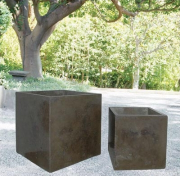 The distressed finish on these boxes makes the planters look both modern and aged. (treillage.com) The distressed finish on these boxes makes the planters look both modern and aged. (treillage.com)