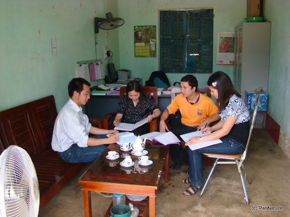 Dau Ngoc Cong (left), PanNature's EE Program Assistant, is working with local teachers in Yen Dinh commune in the buffer zone of the nature reserve.