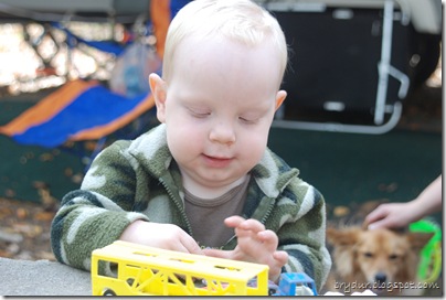 Mike playing with cars