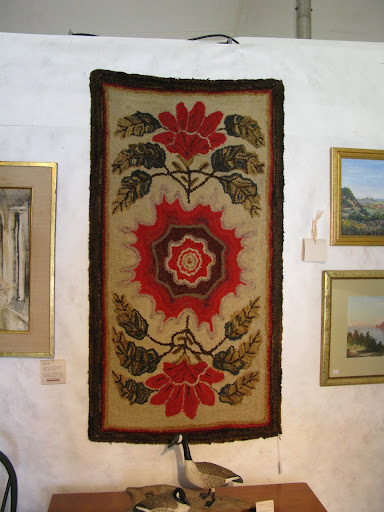 The colors, pattern and layout of this hooked rug I found particularly inspiring. It is almost modern looking in its graphic presentation. The colors, pattern and layout of this hooked rug I found particularly inspiring. It is almost modern looking in its graphic presentation.