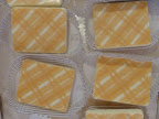 Julie, the chocolatier at Pomona Chocolates, also applied the plaid transfer (the artwork came from Albertine Press and was made by American Chocolate Designs) to white chocolate.