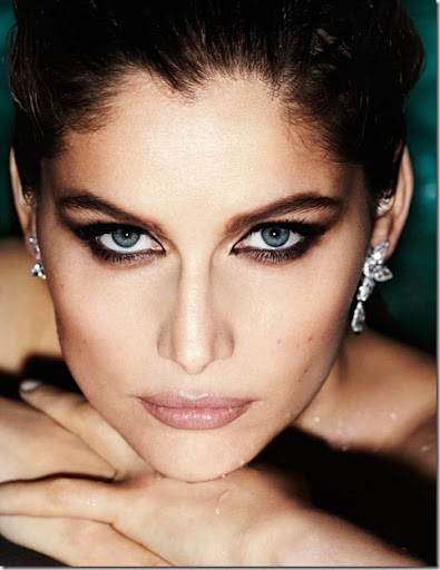 swan and biker chic French model turned actress Laetitia Casta appears