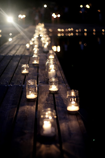 Canning jars with candles lined the dock.
Taryn said the effect, at sundown, was brilliant and so romantic.