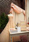 This beautiful gown is by Peter Langner. Also featured, Dom Perignon's Wedding Champagne, and a pink and gold cake featured in the pages of Martha Stewart Weddings. This beautiful gown is by Peter Langner. Also featured, Dom Perignon's Wedding Champagne, and a pink and gold cake featured in the pages of Martha Stewart Weddings.