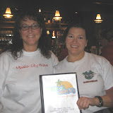 Kathleen and Debra - current and former MCPHINS prezes checking out the fine menu at Barefoot Charlies.