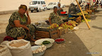 Women selling fruits and vegetables
