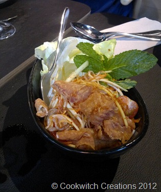 Crispy fish with green mango salad