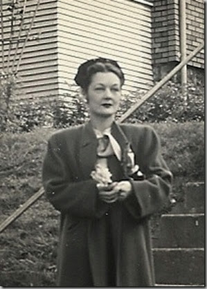 DUNCAN_Ruth E. standing at bottom of steps with coat on_12 May 1947_cropped