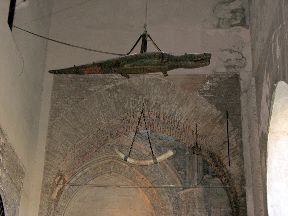 There's a story behind the alligator and elephant tusk at the cathedral entrance, but I can't remember it!