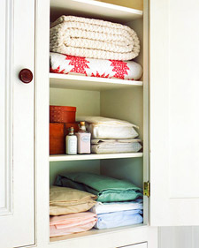 For a tidy linen closet, slip each sheet set into one of its pillowcases, and store the sets by size -- twin, full, and so on -- with colors, trim, or other defining details clearly visible.