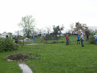 WACO Students and other volunteers help to clean up damage at 1367 111th Street in Henry County