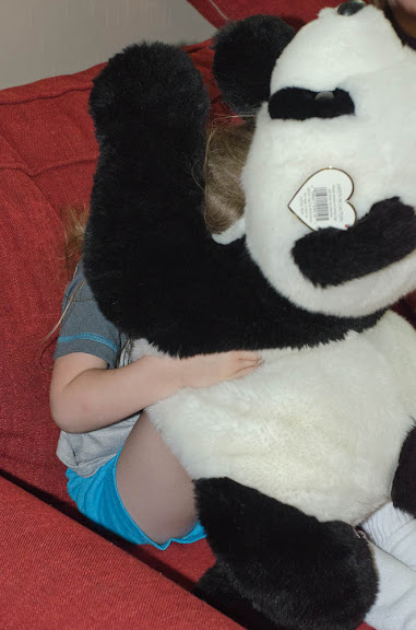 Hiding behind the panda