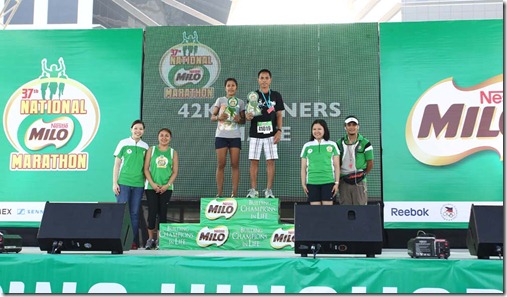 42K Male and Female Winner with MILO Executives at the Manila Eliminations of the 37th National MILO Marathon 42K Male and Female Winner with MILO Executives at the Manila Eliminations of the 37th National MILO Marathon