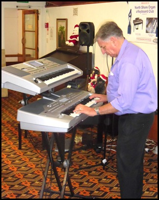 Our resident professional musician, John Bercich, brought two Korg keyboards to entertain us with. Loved the White Christmas arrangement.