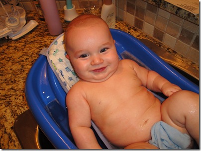 46.  Smiling in tub