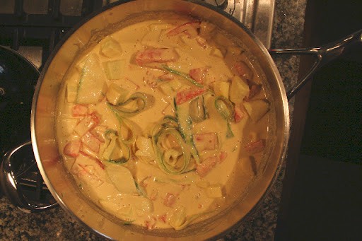 Cover the veggies with the sauce and warm until heated through.