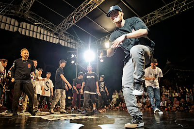 Japanese B-Boy Nori does a little winner's dance after winning Red Bull BC One Asia Pacific Final, at Kushida Shrine, in Fukuoka, Japan, on October 12, 2013. // Nika Kramer/Red Bull Content Pool // P-20131015-00100 // Usage for editorial use only // Please go to www.redbullcontentpool.com for further information. //
