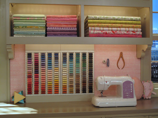 One of the sewing areas on the set of my show - I love the thread rack.
