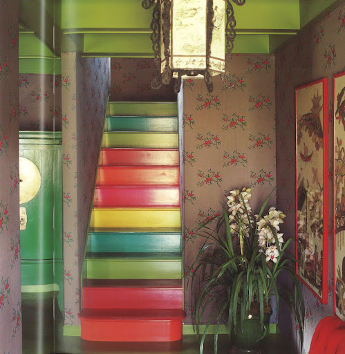 What a welcome surprise from this splay of colors on the stairwell! Although bright and varied, the shades are strategically linked with elements from the room's other decor to create a harmony of tones. What a welcome surprise from this splay of colors on the stairwell! Although bright and varied, the shades are strategically linked with elements from the room's other decor to create a harmony of tones.