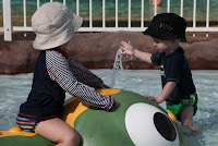 Thor and Oscar playing in the kiddies lagoon