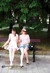 Two girls sitting one upshot