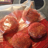 The two burgers in plastic will be prepared sous-vide and then skillet-grilled; the other two will go straight on the grill.