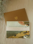 The booklet in the welcome box also featured imagery from the Audubon book and a metallic envelope.