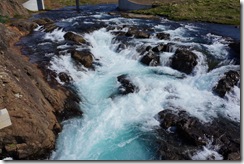 Waterfall by a house Waterfall by a house