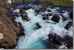 Waterfall by a house