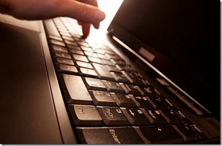 3532920-laptop-background-with-a-hand-hitting-a-key-in-the-back 3532920-laptop-background-with-a-hand-hitting-a-key-in-the-back