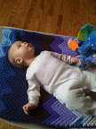 Audrey hanging out with her elephant toy.