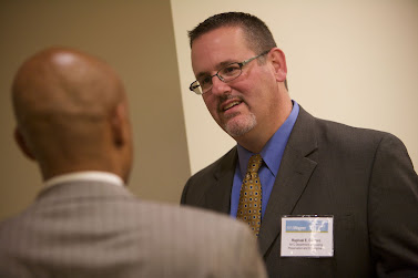 Rafael E. Cestero, Commissioner of the NYC Department of Housing Preservation and Development, listens to a participant at the Leading Large Scale Change briefing event hosted by RCLA and Accenture.  Photo: Sam Hollenshead