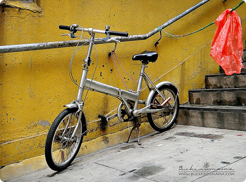 Bicycle-against-yellow-wall Bicycle-against-yellow-wall