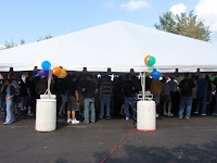 Prepping for the champagne toast in our parking lot on Launch Day.