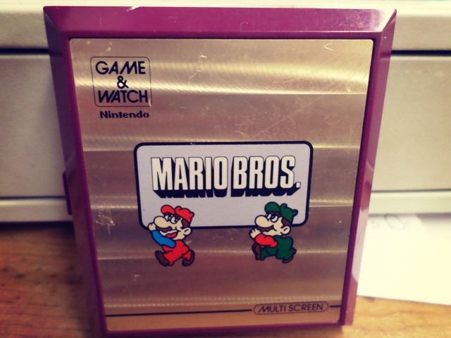 Mario Bros. Handheld Game Front