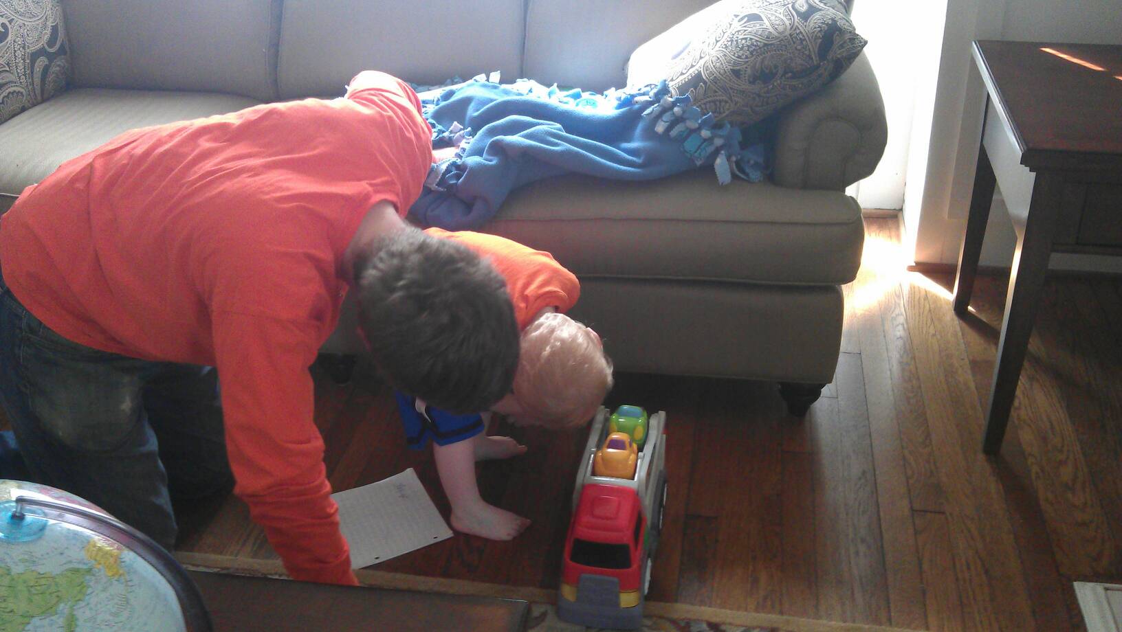Trying to get a car from under the couch