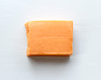 A brick of Kraft cheddar cheese