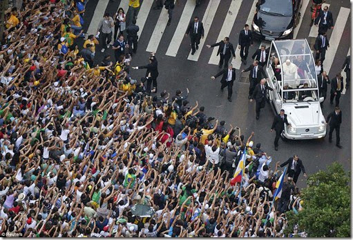 Pope Francis greets a crowd of the faithful from his Popemobile in downtown Rio de Janeiro, July 22 - Copy Pope Francis greets a crowd of the faithful from his Popemobile in downtown Rio de Janeiro, July 22 - Copy