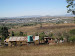 The Matsapha industrial area is in the background.