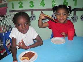 Benllina and Nicole think there is nothing better than pizza