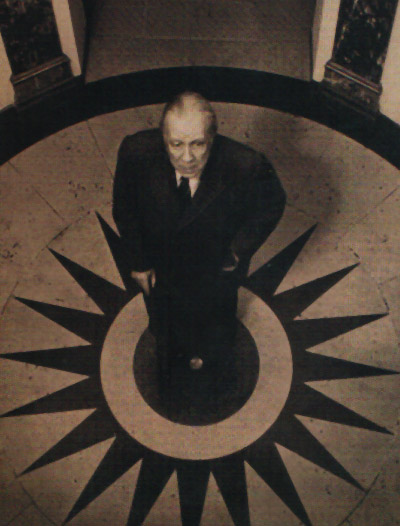 Jorge Luis Borges, standing in a hotel photo Pepe Fernandez.jpg
