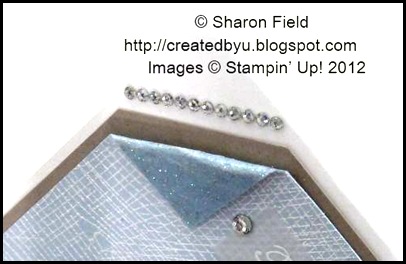 popped, embossed and blinged up corner in bashful b lue